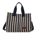 Gestreepte canvas draagtas voor dames met zwart-witte verticale patronen en handgrepen - Blauw