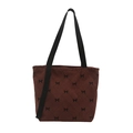 Brown corduroy quilted tote bag with black bow print and spacious main compartment - Brown