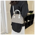 Quilted shell handbag in beige floral pattern with white leather straps and gold hardware - White
