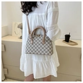 Chic beige crossbody shell bag with monogram pattern and brown leather straps - Khaki