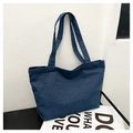 Detail of dark blue denim tote bag showing twill fabric texture and long shoulder straps - Dark Blue