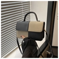 Detalle del bolso bicolor minimalista con asa elegante y correa de hombro ajustable - Caqui