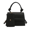 Chic black structured faux leather handbag with knot handle and small pendant coin purse - Black