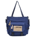 Blaue Nylon-Umhängetasche für Pendler mit vielen Taschen und großer Frontklappe - Blau