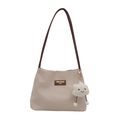 Sac seau minimaliste en tissu gaufré avoine avec bandoulière en cuir marron et breloque - Avec Ornement / Marron