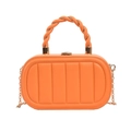 Sac à main orange matelassé verticalement avec poignée torsadée et chaîne dorée - Orange
