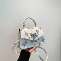 White butterfly print handbag with silver bow metal clasp and adjustable shoulder strap - Silver