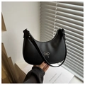 Detail of black matte crescent hobo bag with a delicate silver bow charm accessory - Black