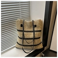 Macro shot of striped woven tote bag featuring black leather straps and gold zipper details - Multi-Striped Style (Style 1)