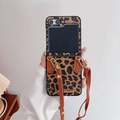 Detailed view of leopard print folding phone case with adjustable leather crossbody strap - Leopard Yellow (Aquarius Label) / Samsung ZFlip3