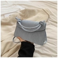Light blue structured crossbody handbag with a stylish knotted handle and leather texture - Blue