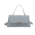 Chic light blue crossbody bag with crocodile texture and polished metal hardware - Blue