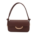 Minimalist dark brown leather crossbody bag with distinctive gold crescent metal buckle - Brown