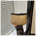 Detail of hand-woven straw crossbody bag with black leather trim and natural texture - Black