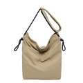 Large khaki nylon tote bag with patterned rope strap and front pocket in minimalist style - Khaki