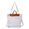 White canvas tote bag with brown leather trim and Light Fashion text print - White