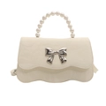 Cream bow accent crossbody bag with pearl handle and wave-edge flap design - White
