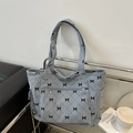 Borsa tote in velluto a coste blu con stampe a fiocco nero e cuciture trapuntate - Blu