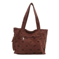 Bruine corduroy shopper met zwart strikpatroon en handig ritsvak aan de voorzijde - Bruin