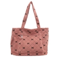 Roze corduroy shopper met zwarte strikprint en gewatteerd patroon in vooraanzicht - Roze