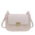 Light pink crossbody bag with gold buckle and diamond quilted texture on white background - Off White