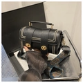 Detail of black Boston bag with gold studs and vintage pattern wide shoulder strap - Black