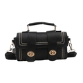 Vintage black leather handbag with white stitching and gold lock on white background - Black