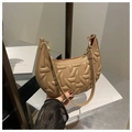 Close-up of khaki hobo shoulder bag with embossed geometric texture and gold hardware - Khaki