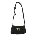 Minimalist black suede shoulder bag with silver bow accent and beaded strap details - Black