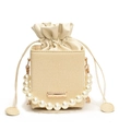 Beige woven bucket bag with elegant oversized faux pearl handle and drawstring closure - White