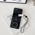 Detail of Galaxy Z Flip leather case with camera-style decor and checkered strap - Samsung ZFlip3 / Cartoon Round Ear Camera Kickstand Style (Black)