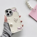 Chic iPhone 16 Pro case with pearls, pink ribbon, and silver heart in ballet style - Apricot / iPhone 15 Pro Max