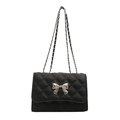 Chic black quilted crossbody bag with silver bow accent and elegant chain strap - Black