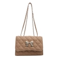 Chic beige quilted crossbody bag with silver bow buckle and elegant metal chain strap - Khaki