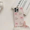 Pink iPhone 16 Pro Max case with 3D ribbons and heart charms in a lifestyle setting - Bowknot Wrinkled Heart-Electroplated Frame / Pink / iPhone 7/8/SE 2020