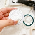 Close-up of clear acrylic collapsible phone grip showing retractable stand mechanism - Magnetic Grip - Transparent Flat Round