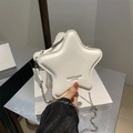 Chic white star shaped crossbody bag with silver chain strap and leather texture - White