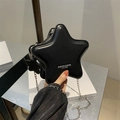 Unique black star-shaped crossbody bag with silver chain and chic leather finish - Black
