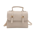 Chic cream white ballet style handbag with pleated leather texture and gold metal accents - White