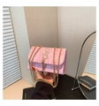 Detail of pink pleated crossbody bag with gold metal hardware and luxury tassel - Pink