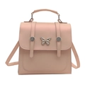 Mini zaino in pelle rosa con fibbia a farfalla argentata e borchie metalliche - Rosa