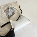 Minimalist white glossy faux leather shoulder bag in a stylish lifestyle setting - White