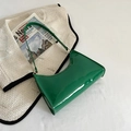 Chic green patent leather hobo bag with glossy finish and minimalist shoulder strap - Green