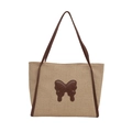 Beige gewebte Strohtasche mit braunem Leder-Schmetterling und schlanken Schultergurten - Braun