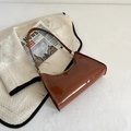 Chic brown glossy leather underarm bag for women with a sleek minimalist aesthetic - Brown