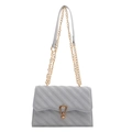 Light grey quilted crossbody bag with gold chain strap and horseshoe clasp in variant - Blue