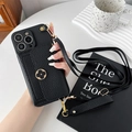 Close-up of black litchi grain leather phone case with clover metal buckle and crossbody strap - Black / iPhone 7/8/SE 2020