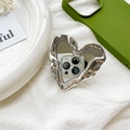 Macro shot of silver liquid metal heart phone grip with mirror surface and lava texture - Pleated Heart Mirror (700732) / Silver