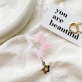Close-up of heart-shaped glitter phone grip with star pendant and pink gradient star panel - Pink White Star (Pink-White)