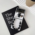 Detail of Galaxy Z Flip case with black bead chain, 3D bear charm and coffee cup motif - White / Samsung ZFlip3